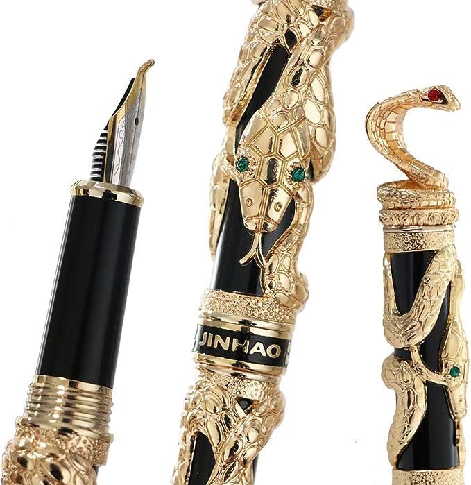 золотая ручка, украшенная чернилами змеиной кобры